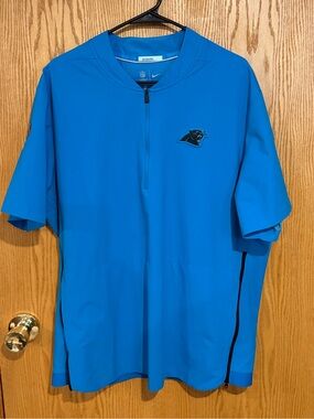 Men's Carolina Panthers team issue on field Nike Quarter-Zip Short Sleeve jacket